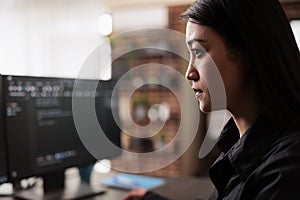 System engineer writing html code and javascript on terminal window