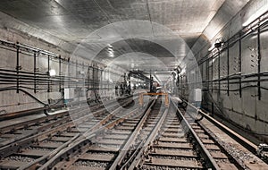 System forks railway tracks in the modern subway tunnel
