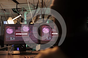 System hacked alert message on computer screen