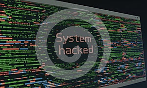 System hacked message on computer screen with glitching code and data breach warning