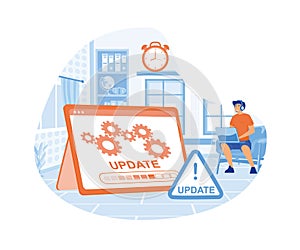 System update. The programmer behind the computer screen.