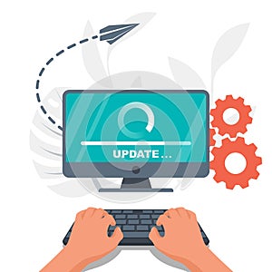 System update. The programmer behind the computer screen