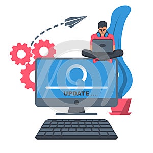 System update. The programmer behind the computer screen