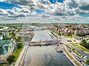 Szczecin aerial view. Odra river and Long bridge linking the Wieleckie embankment with Customs. City landscape.