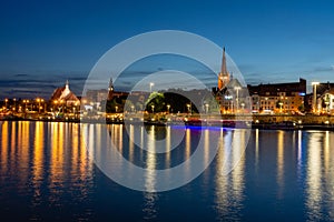 Szczecin in Poland. Light reflections of buildings in the river