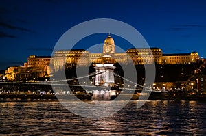 Szechenyi Chain Bridge and Buda Castle by night in Budapest Hungary