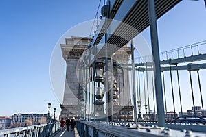 Szechenyi chain bridge in the morning sun in Budapest Hungary