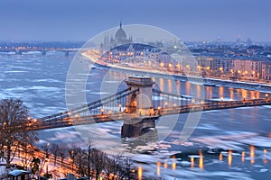 Szechenyi chain bridge and Budapest view in winter night