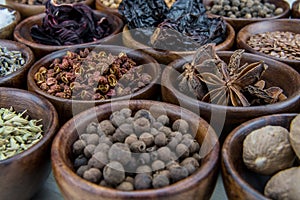 Szechuan Peppercorns in Bowl Among Other Spices