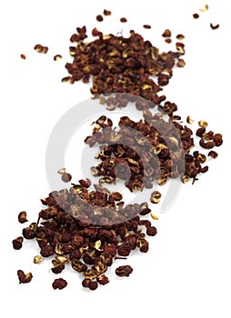 Szechuan or Sichuan Pepper, zanthoxylum simulans, Asiatic Spice against White Background