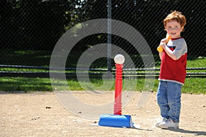 T-ball player up to bat photo