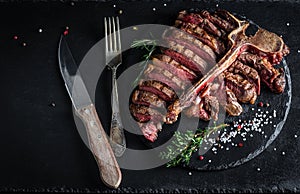 T-bone steak, porterhouse steak, bistecca alla fiorentina. beef steak Medium rare. American cuisine. banner, catering menu recipe photo