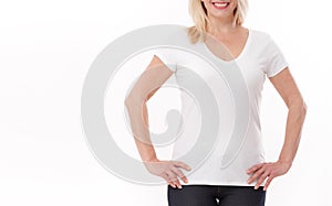 T-shirt design and people concept - close up of woman in blank white t-shirt, shirt front isolated. Mock up.