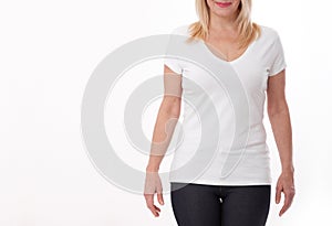 T-shirt design and people concept - close up of woman in blank white t-shirt, shirt front isolated. Mock up.