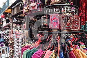 T-shirts, purses and other merchandise on a street market in Kuala Lumpur, Malaysia, Asia