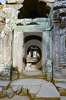 Ta Prohm temple, Siem Reap, Cambodia. Demaged temple entrance. photo