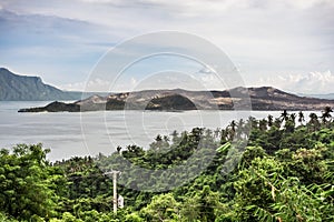 Taal volcano and lake as seen from Ligaya Drive, Tagaytay, late afternoon. Shot after 2020 eruption, vegetation still barren in photo