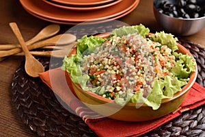 Tabbouleh on a rustic table