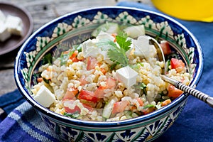 Tabbouleh salad in authentic bowl