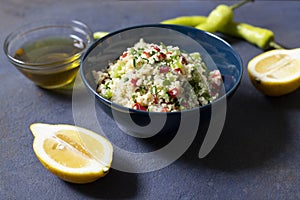 Tabbouleh salad with couscous, parsley, lemon, tomato, olive oil. Levantine vegetarian salad