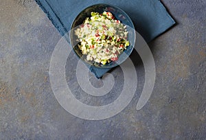 Tabbouleh salad with couscous, parsley, lemon, tomato, olive oil. Levantine vegetarian salad