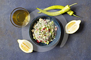 Tabbouleh salad with couscous, parsley, lemon, tomato, olive oil. Levantine vegetarian salad