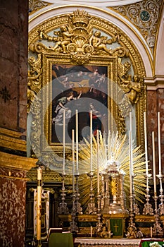 Tabernacle, candles and altar in the church