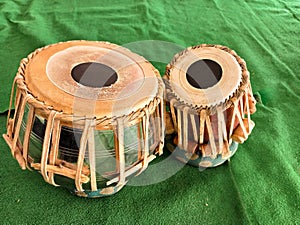 tabla musical instrument keep on green background