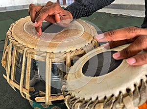 tabla player playing tabla close up shot