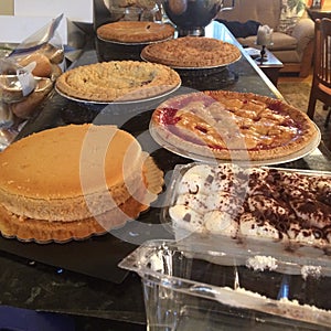Holiday spread of pumpkin, apple pies and pumpkin cheesecake