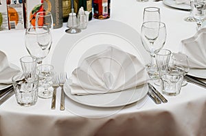 Table appointments for dinner in restaurant
