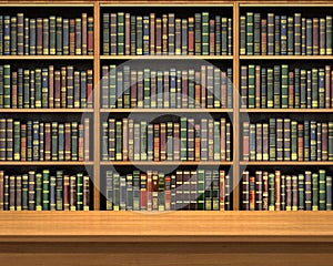 Table on background of bookshelf full of books