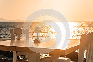 Table on the beach at sunset