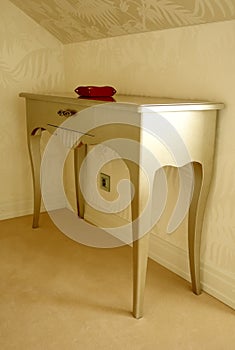 Table in bedroom.