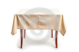Table with beige tablecloth isolated on white background