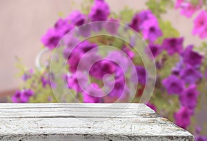Table with blurred flowers