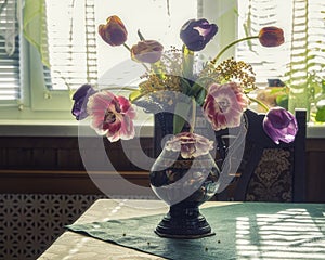 Table with bouquet of flowers