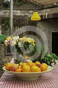 Table cafe beach sea flowers vase orange yellow red white rose purple chairs oranges rosemary old vintage apple