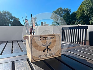 A table in a cafe or restaurant with napkins, forks, knives