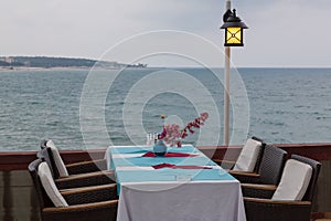 Table in a cafe by the sea
