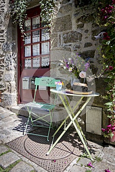 Table and Chair Outside in the Street