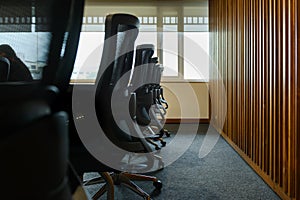 Table and chairs in empty business conference room