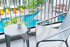 Table and chairs on living terrace.