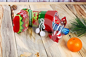 On the table is a colorful Christmas sock.