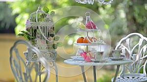 Table with crockery cups plates decorative wedding entourage