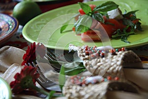 Table decor with flowers and salad