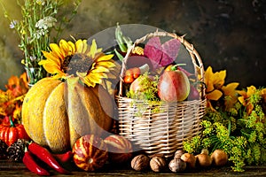 The table, decorated with vegetables and fruits. Harvest Festival. Happy Thanksgiving. Autumn background. Selective