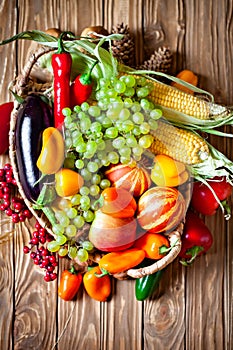 The table, decorated with vegetables and fruits. Harvest Festival. Happy Thanksgiving. Autumn background. Selective