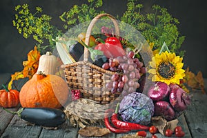 The table, decorated with vegetables, pumpkins and fruits. Harvest Festival, Happy Thanksgiving. Autumn background