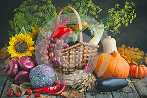 The table, decorated with vegetables, pumpkins and fruits. Harvest Festival, Happy Thanksgiving. Autumn background